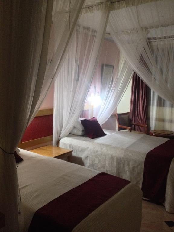 J Residence Motel เอนเทบเบ้ ห้อง รูปภาพ