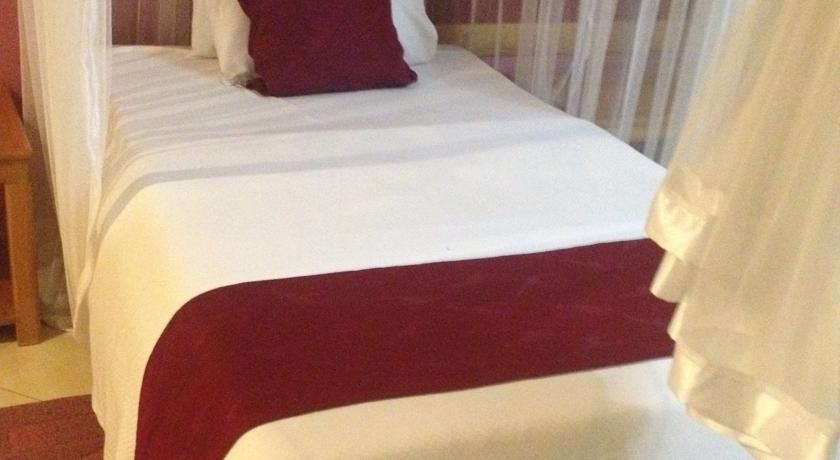 J Residence Motel เอนเทบเบ้ ห้อง รูปภาพ